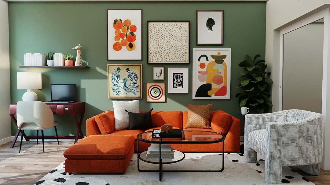 Modern living room with orange sofa and home office.